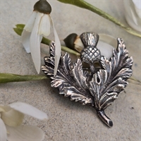 tidselblade-blomst-sølvfarvet-metal-skotsk-broche-vintage-smykke